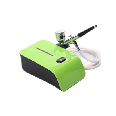 China Continuously Portable Compressor Kit Makeup Machine Mini Nail Tattoo Cake Decorating Airbrush Set for sale