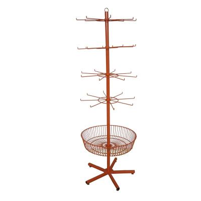 China Environmental Friendly Custom Floor Spinner Display Stand With Leg Base Hooks And Rotating Basket Display Rack for sale