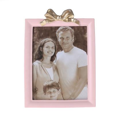 China Morden simple and creative modern arch decorative photo frame with resin frame for sale