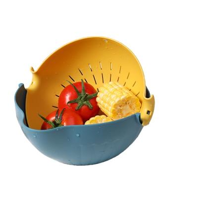 China Sustainable Household Rotating Double Plastic Kitchen Fruit And Vegetable Folding Table Decoration Fruit Dish for sale