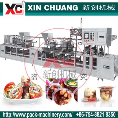 China Small cup SS#304 stailess steel cup filling sealing machine 30mm diameter for double color chocolate for sale