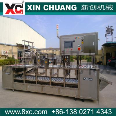 China Food Plastic Cup Filling And Sealing Machine for sale