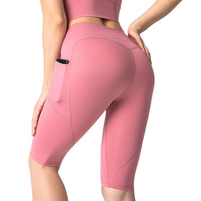 China New QUICK-DRY hip lifting Yu pocket Jia suit five-minute pants women's tight naked feel for sale