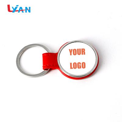 China Popular Gift New Arrival Custom Logo Round Handmade Leather Key Chain for sale