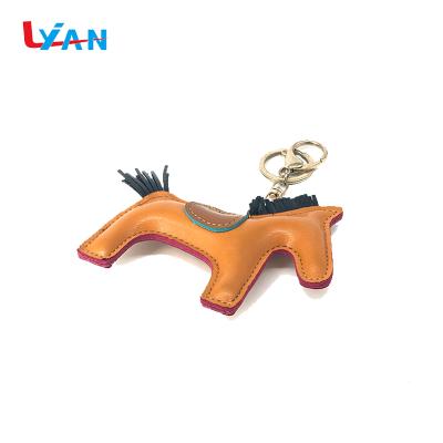 China Personalized Gift Top Quality Faux Leather Animal Logo Key Chain for sale