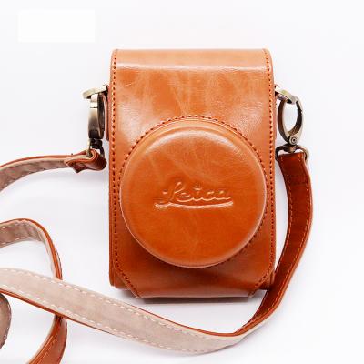 China Outdoor Fashiontable Custom Waterproof Leather Camera Backpack Shoulder Messenger Bag for sale