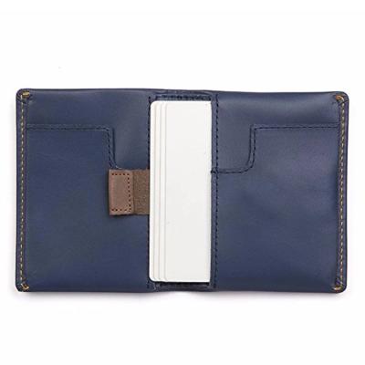 China RFID Blocking Custom Men's Front Pocket Vegetable Leather Bifold Pull Tag RFID Blocking Slim Credit Card Holder Slide Wallet for sale