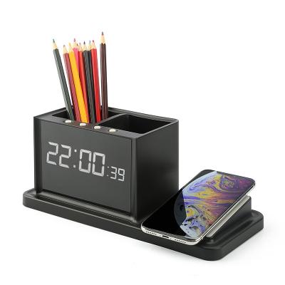 China Mobile Phone 3 in 1 Wireless Charger with Clock and Pen Holder for sale