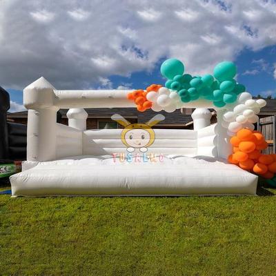 China commercial 1000D 0.55mm PVC Tarpaulin Inflatable Bounce House Bouncy White Tusalmo Castle Wedding Inflatable Bouncer For Party for sale