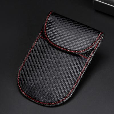 China Fashion Custom Logo Black Carbon Fiber Unisex Vertical Avoid RFID Car Cover Remote Key Chain Case for sale