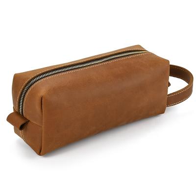 China New Arrival Brown Simple Fashionable Durable Cosmetic Bag Unisex Vintage Genuine Leather Toiletry Bag For Outdoor for sale