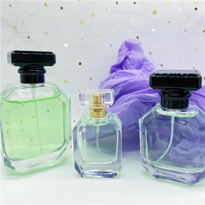 China 30ml 50ml 100ml Cosmetic Clear Rectangle Shape Glass Perfume Bottles With Acrylic Cap for sale