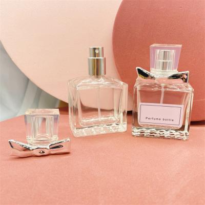 China Square 30ml Cosmetic Wholesale Glass Pump Sprayer Glass Perfume Bottles for sale