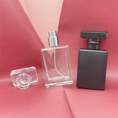 China Cosmetic Clear 30ml Rectangle Black Empty Sprayer Pump Glass Perfume Bottles for sale