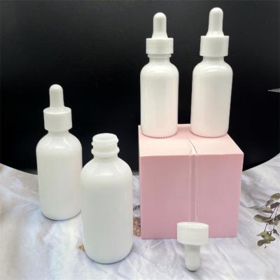 China 1oz 2oz Porcelain Cosmetic Dropper Bottle Decorative Essential Oil Bottle for sale