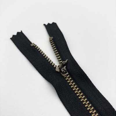 China YG metal yg cheap brass zipper 15cm for denim breeches for sale