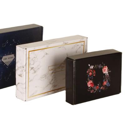 China Recyclable custom size color print boxycharm free design elegant black white paper packaging boxes for sale