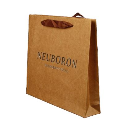 China Recycled Materials Custom Printed Beige Paper Boutique Shopping Mailing Bags With Ribbon Handle for sale