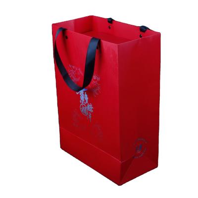 China Handmade handle craft making wine color iredescent paper carrier bag with logo print for sale