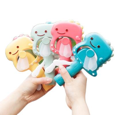 China Small Dinosaur Handheld Strong Wind Manual Pressure Electric Fan Small Easy Press Fan To Carry for sale