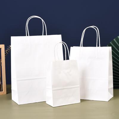 China Custom Printed Small Logo 100% Recyclable Cheap Plain Paper Recyclable Gift Bags With Twist Handles White Paper Bag for sale