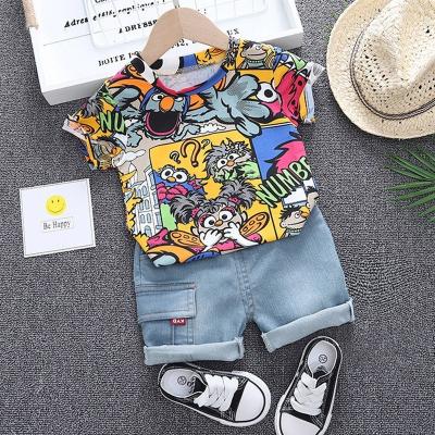 China Summer Casual Hot Selling Children's Clothing Sets Baby Boy Sets Kids Two-Piece Polo T-shirt Cartoon Camouflage Summer Shorts Cool Wear for sale