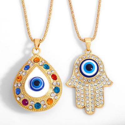 China Evil Eyes Fatima Hand Necklaces Turkish Blue Evil Eyes Pendant Necklace Diamond Jewelry Gold Plated Women Free Color Matching Eyes for sale