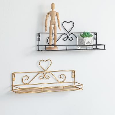 China Modern Simple Minimalist Iron Wall Shelf Living Room Bedroom Wall Decoration Storage Free Punch Rack for sale