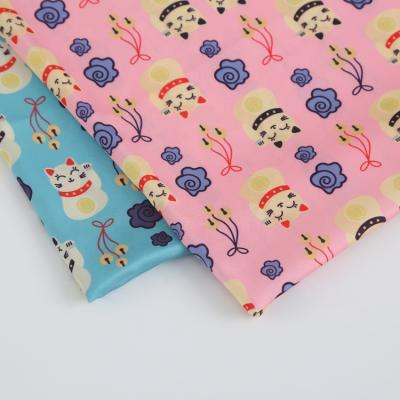 China Blue pink lucky memory cat pattern custom plain printed polyester fabric for scarf and headwear for sale