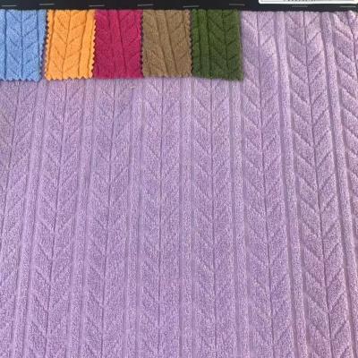 China Custom Knitted 100% Polyester Flame Retardant Stretch Jacquard Swimwear Tank Top Fabric Price Per Meter For Dresses for sale