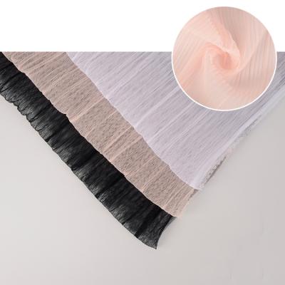 China Anti-static custom crush polyester tecidos malha fabric for making clothes kids clothing mesh tule fabric for sale