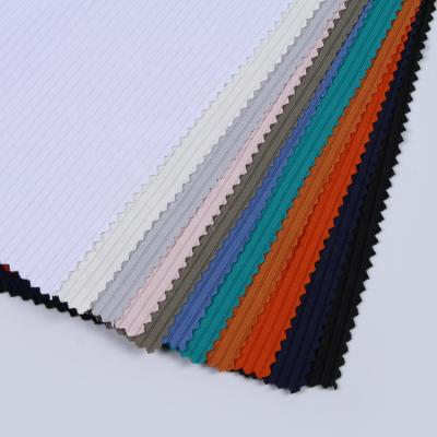 China Memory plain dyed loose knit sweater fabrics flat tessuto thick polyester rib stretch knit hacci fabric for sale