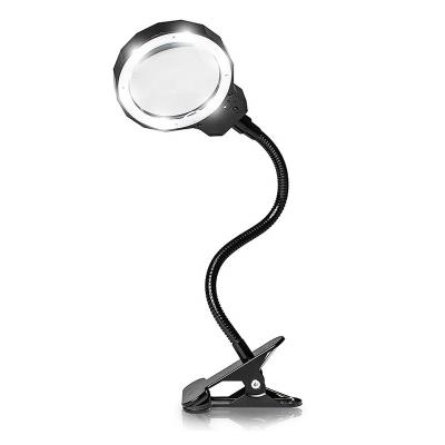 China ABS+ aluminum alloy+ K9 optical glass handheld clip two in one 360 ​​degree free adjustment magnifying desk lamp illuminated magnifying glass with led light for sale