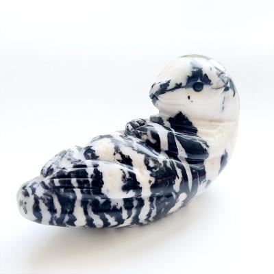 China Europe Crystal Handmade Animal Sea Dog Jasper Sea Lion Carving Natural Black and White Statue for Animal Welfare Souvenirs for sale