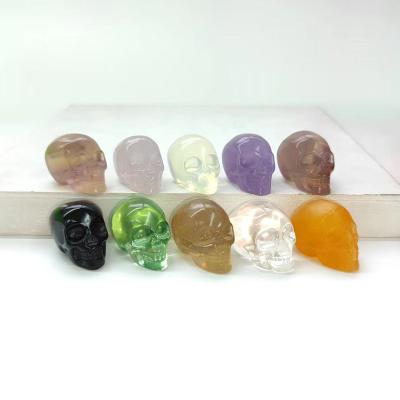 China Europe 1.3 in to 1.5 in Bulk Crystal Skulls Wholesale Fluorite Amethyst Skulls Tiny Small Size for sale