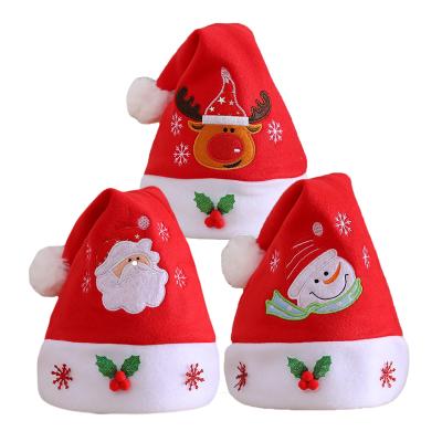 China Fleece Fabric Snowman Santa Claus Reindeer Embroidered Christmas Hat Fleece Christmas Hat for sale