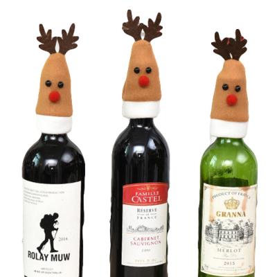 China Fleece Fabric Christmas Hat Reindeer Mini Santa Hat For Wine Bottle Cover Topper for sale