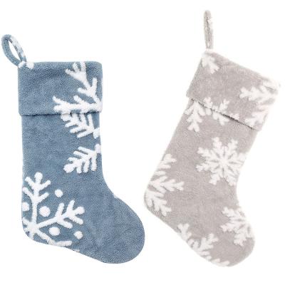 China Custom Jacquard Plush Fabric Snowflakes Jacquard Weave Plush Christmas Stockings For Christmas Tree Hanging for sale