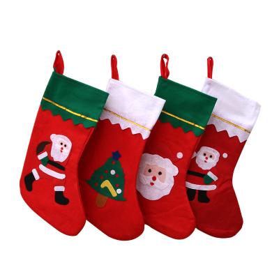 China Wholesale Cheapest Christmas Felt Fabric Small Bumps Bulk Christmas Stockings For Xmas Party Decoration for sale