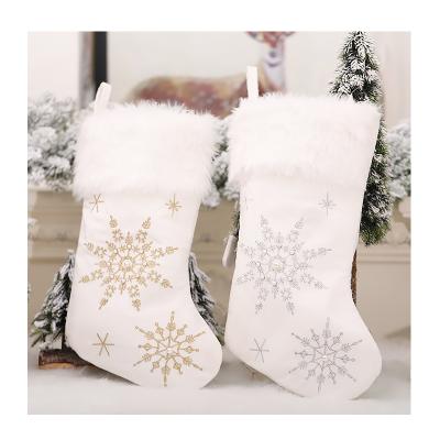 China Sequin Plush Fabric Embroidered Snowflakes Stocking Sparkly Plush Sequin Christmas Socks for sale