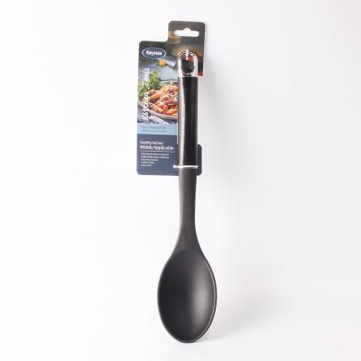 China Durable Kitchen Cookware Nylon Solid Spoon With ABS Handle for sale