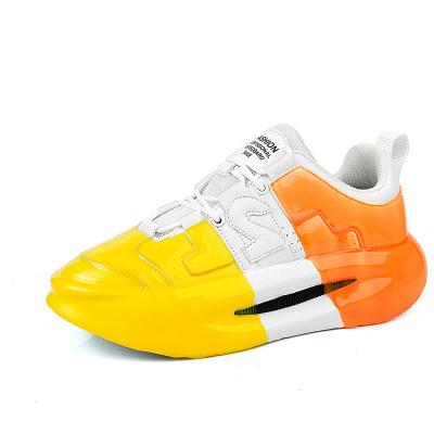 China Fashion trend color bump round head plus protection design air cushion shock light leisure sports thick bottom wear-resistant walking shoes for sale