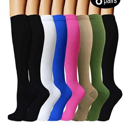 China Sports Antibacterial Colorful Compression Long Socks For Women Men for sale