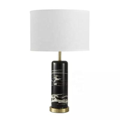 China Contemporary postmodern Nordic minimalist LED table lamp hotel lobby metal table light with stone base for bedroom for sale