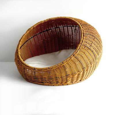 China Handcrafted Rattan Bed Round Rattan Wicker Basket Pet House Sustainable Pet Bed Handwoven Rattan Bed Basket With Soft Cushion For Cats Or Dog for sale