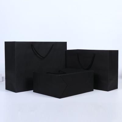 China Recycled Materials Custom Clean Logo Black Paper Bag With Handle Style Horizontal Bag for sale