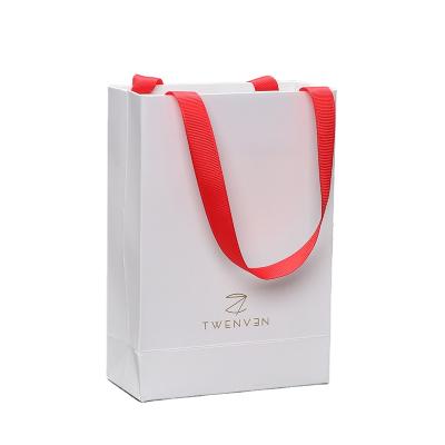 China Recycled Materials China Manufacturer White Luxury Printed Custom Gift Shopping Paper Bag for sale