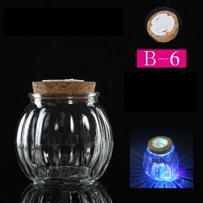 China Decoration Item Flashing Glass Bottle With LED Light Wooden Lid Handmade Craft for sale