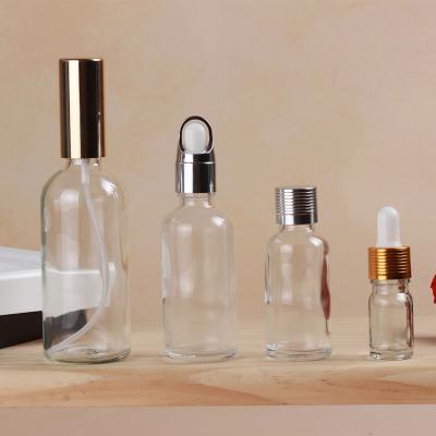 China Pharmaceutical popular spray glass bottle clear bottle with dropper for essential oil for sale