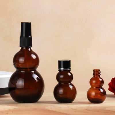 China 10ml Amber Calabash Bottle With Dropper Essential Oil Pharmaceutical Bottle With Clear Cover for sale